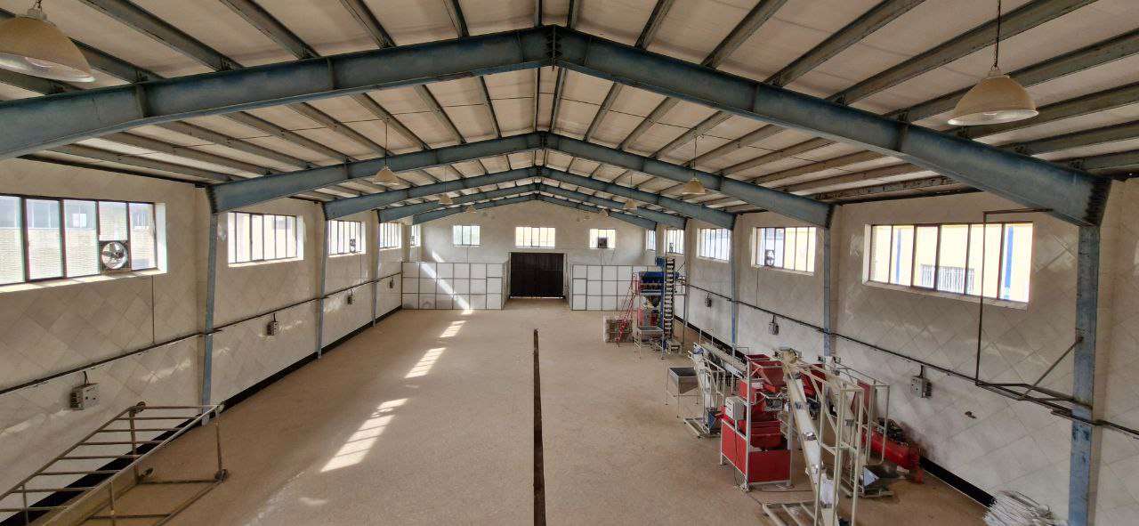 فروش کارخانه بسته‌بندی حبوبات با پروانه معتبر - شهرک صنعتی خوارزمی 650 متر _ املاک صنعت سوله